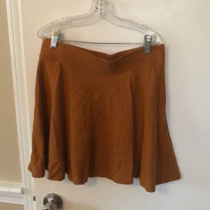 Pleated pumpkin colored mini skirt from forever 21
